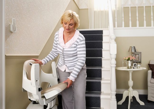 women with indoor straight rail stairlifts
