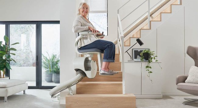 Flow X stairlift - A modern and stylish mobility solution by Aussie Glide, providing comfort and accessibility in home living spaces.